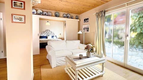 Bed, Living room, Seating area, Bedroom