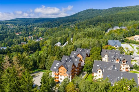 Property building, Nearby landmark, Day, Neighbourhood, Natural landscape, Bird's eye view, Seating area, City view, Mountain view, Street view
