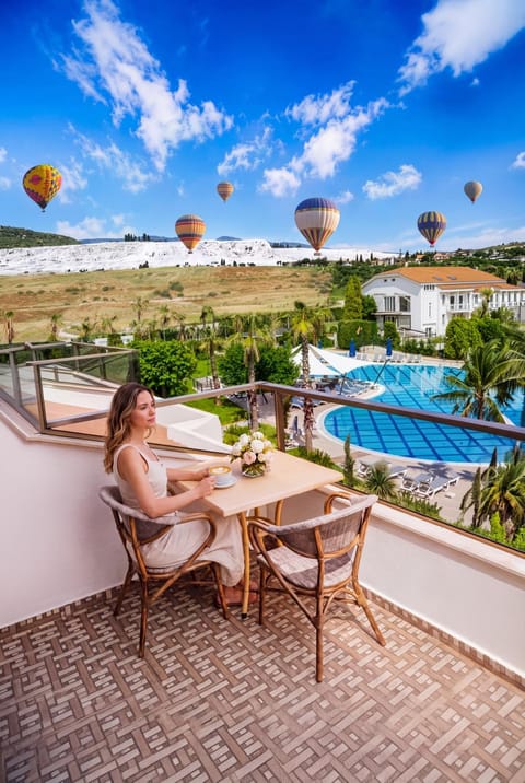 Property building, Day, People, Natural landscape, View (from property/room), Balcony/Terrace, Pool view, Swimming pool