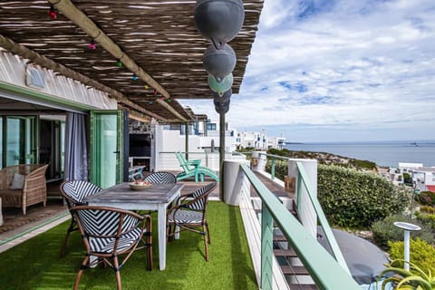 Property building, Patio, Natural landscape, View (from property/room), Balcony/Terrace, Living room, Seating area, Dining area, Sea view