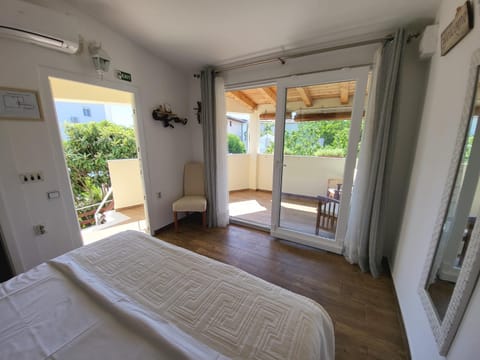 Bed, Balcony/Terrace, Bedroom, air conditioner