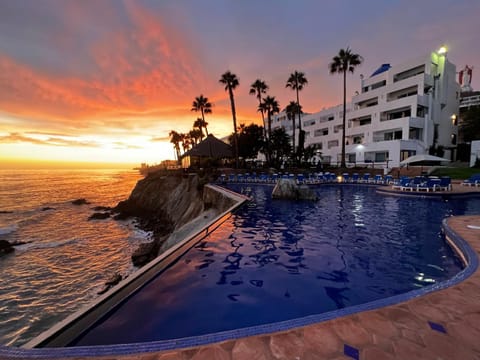 Property building, Natural landscape, Sea view, Swimming pool, Sunset
