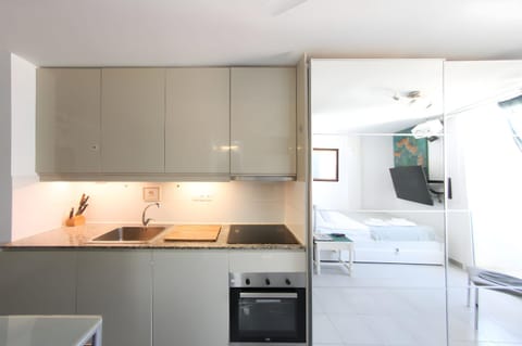 Kitchen or kitchenette, oven, stove