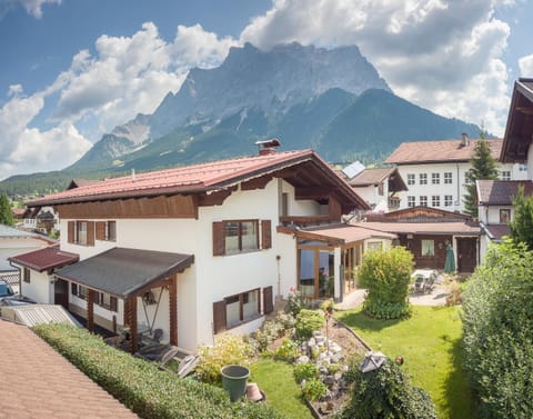 Property building, Facade/entrance, Spring, Day, Natural landscape, Garden, Mountain view