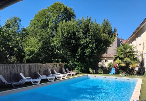 Swimming pool, sunbed