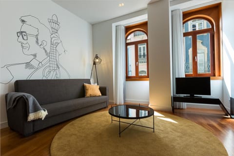 Property logo or sign, TV and multimedia, Living room, City view, Landmark view, Street view, Quiet street view