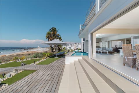 Property building, Patio, Day, Natural landscape, View (from property/room), Balcony/Terrace, Living room, Seating area, Dining area, Pool view, Sea view, Swimming pool
