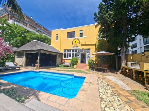 Property building, Day, Pool view, Swimming pool, sunbed