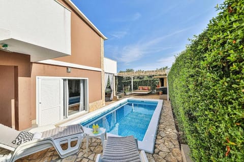Patio, Pool view, sunbed
