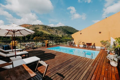 Patio, Nearby landmark, Spring, Day, Natural landscape, Mountain view, Pool view, Swimming pool, sunbed