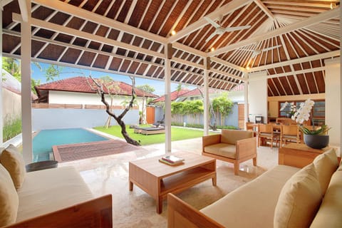 Patio, Living room, Seating area, Pool view, Swimming pool, sunbed