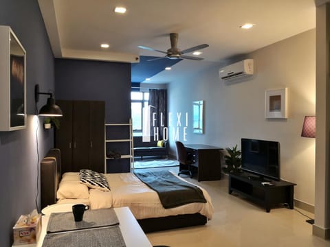 Bed, TV and multimedia, Living room, Seating area, Bedroom
