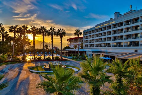 Property building, Facade/entrance, Pool view, Sunset