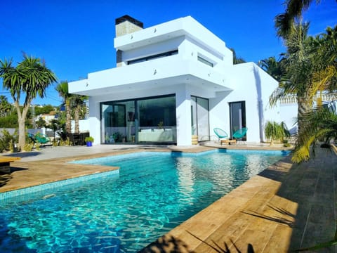 Property building, Patio, Swimming pool