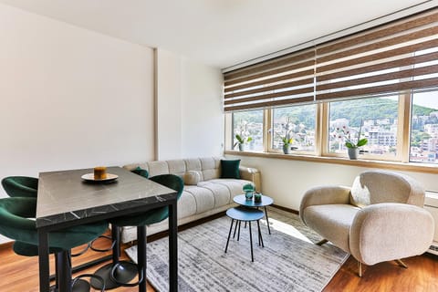 Living room, Living room, Seating area, Dining area, City view