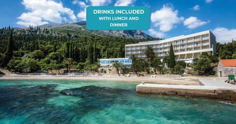 Property building, Day, Property logo or sign, Logo/Certificate/Sign, Text overlay, Sea view