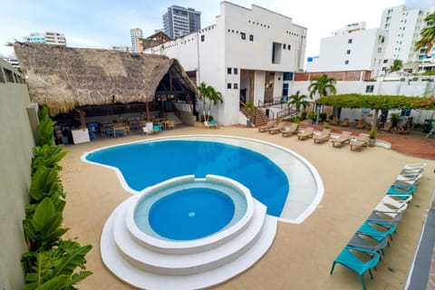 Property building, Patio, Swimming pool, minibar, sunbed