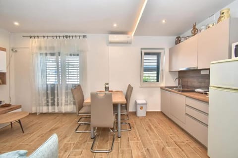 Enjoy a cozy apartment in Slatine 65 m² with terrace Apartment in Šibenik-Knin County, Croatia