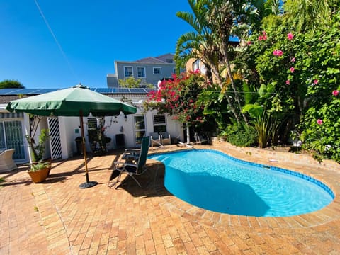 Property building, Patio, Garden, Pool view, Swimming pool, sunbed