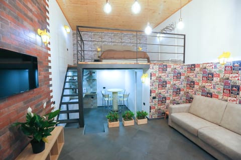 TV and multimedia, Kitchen or kitchenette, Living room, Photo of the whole room, Seating area, Dining area, Bedroom