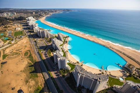 Property building, Bird's eye view, Beach, Pool view