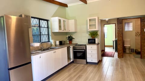 Kitchen or kitchenette, oven, stove