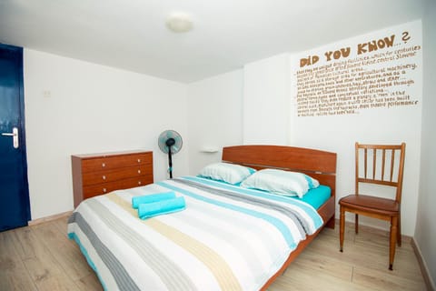 Bed, Bedroom, fireplace, towels, wardrobe