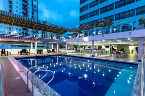 Property building, Balcony/Terrace, Swimming pool, Swimming pool, Sunset
