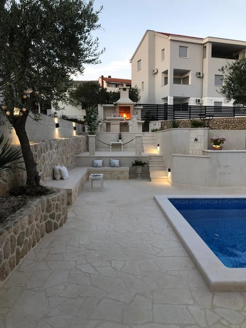 Patio, BBQ facilities, Swimming pool