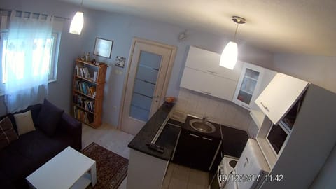 Coffee/tea facilities, Kitchen or kitchenette, Living room, Seating area