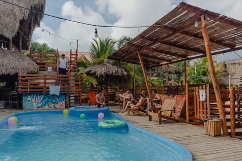 Patio, Day, Guests, Pool view, Swimming pool, group of guests, sunbed