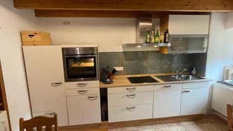 Kitchen or kitchenette, dishwasher, stove, kitchen