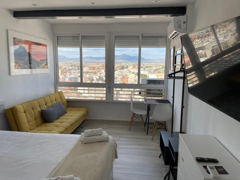 Bed, TV and multimedia, Living room, Photo of the whole room, Seating area, Bedroom