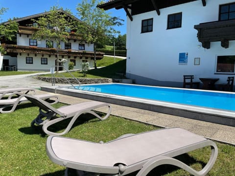 Property building, Living room, Swimming pool