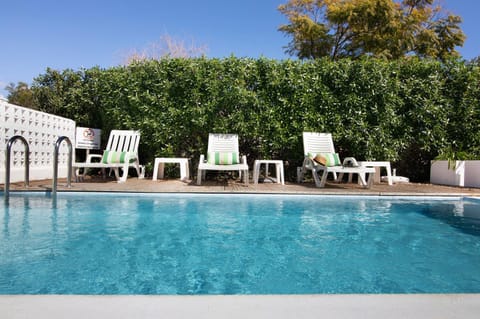 Property building, Living room, Swimming pool