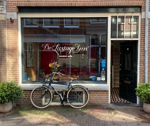 Property building, Facade/entrance, Day, Property logo or sign, Cycling, Logo/Certificate/Sign