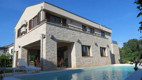 Patio, Facade/entrance, Garden, Beach, Garden view, Pool view, Swimming pool