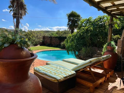 Seating area, Pool view, Swimming pool, sunbed