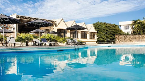 Property building, Pool view, Swimming pool, sunbed