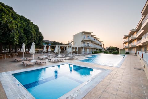 Property building, Swimming pool, Swimming pool, Sunset