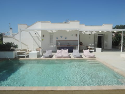 Property building, Seating area, Swimming pool