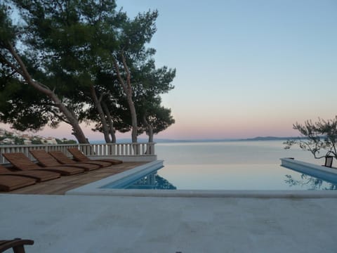 Patio, Patio, Restaurant/places to eat, BBQ facilities, BBQ facilities, Garden, Balcony/Terrace, Spa and wellness centre/facilities, Dining area, Beach, Beach, Swimming pool, Swimming pool, Sunset