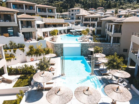 Property building, Spring, Natural landscape, Pool view, Swimming pool, sunbed