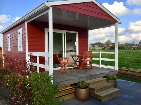 Patio, Facade/entrance, Spring, Garden, View (from property/room), View (from property/room), Balcony/Terrace, Decorative detail, On site, Garden view, Garden view, Sunset