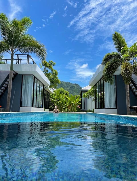 Property building, Day, Natural landscape, Pool view, Swimming pool