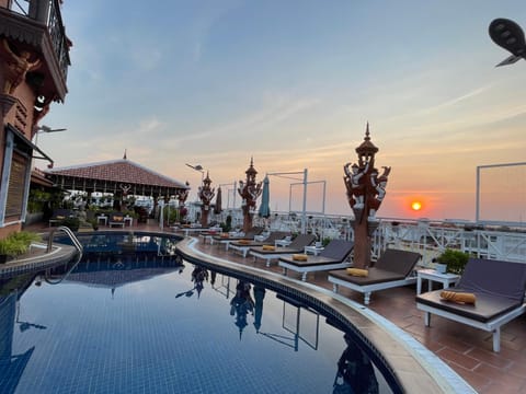 Patio, Day, Natural landscape, Pool view, Swimming pool, Sunrise, Sunset, sunbed