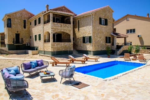 Property building, Patio, Swimming pool