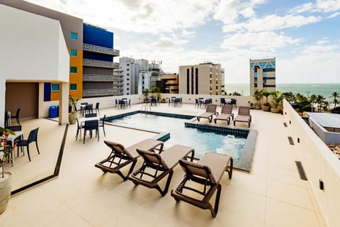 View (from property/room), Balcony/Terrace, Seating area, Swimming pool, Swimming pool, sunbed