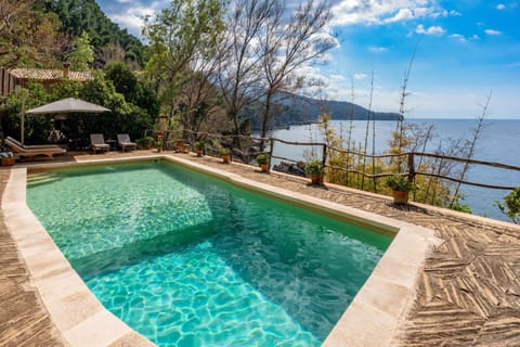 Property building, Living room, Swimming pool