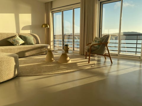 Property building, Living room, Seating area, Sea view